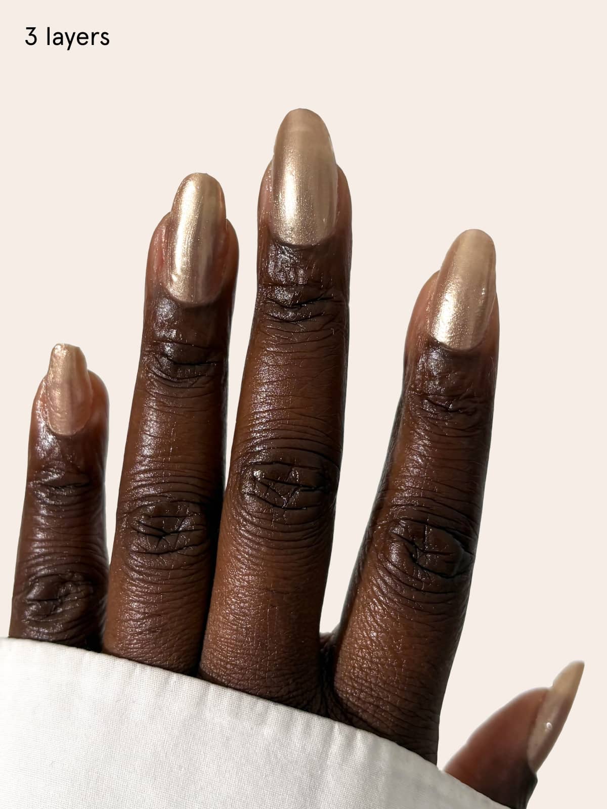 gitti-skinified-nail-tint-no-06-pflegelack-hell-champagnerbronze-mit-schimmer image 7