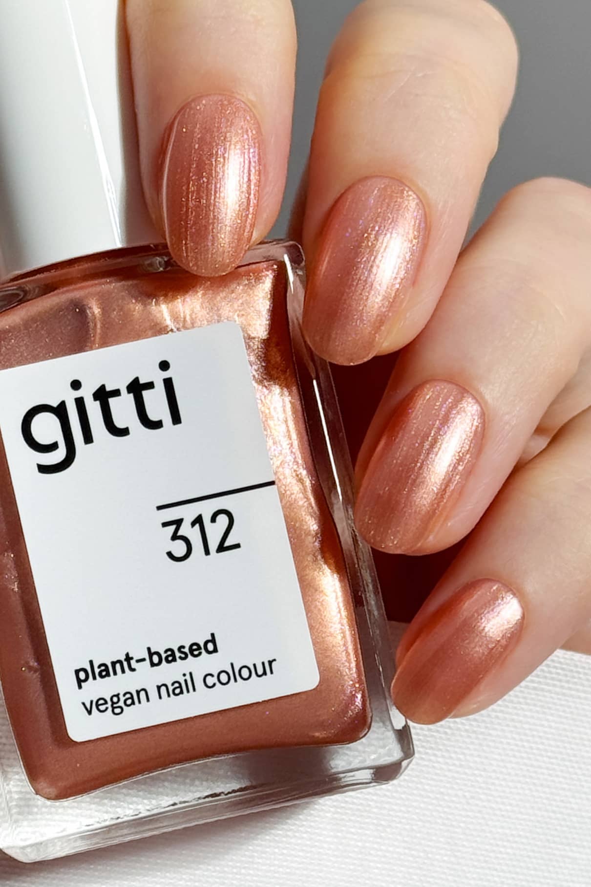 gitti-no-312-nagellack-warmes-metallic-apricot image 2