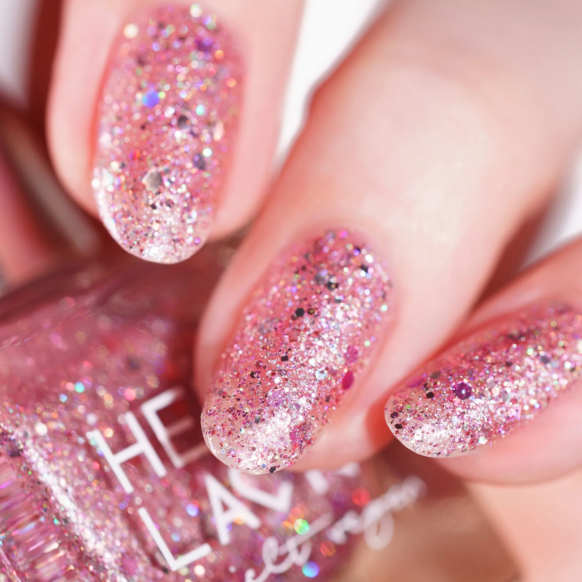 herzlack-rosa-regenbogen-veganer-glitzer-nagellack-holo-rosa-11ml image 3