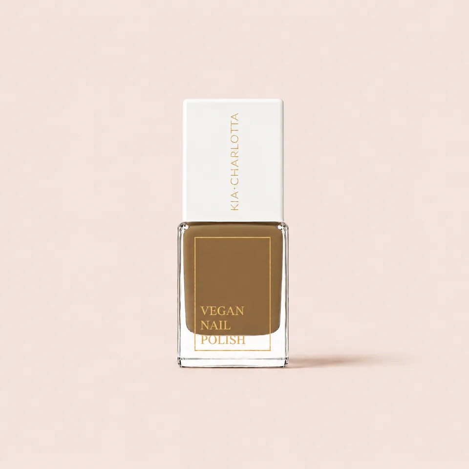 kia-charlotta-nature-stories-veganer-nagellack-ocker-sandgelb image 1