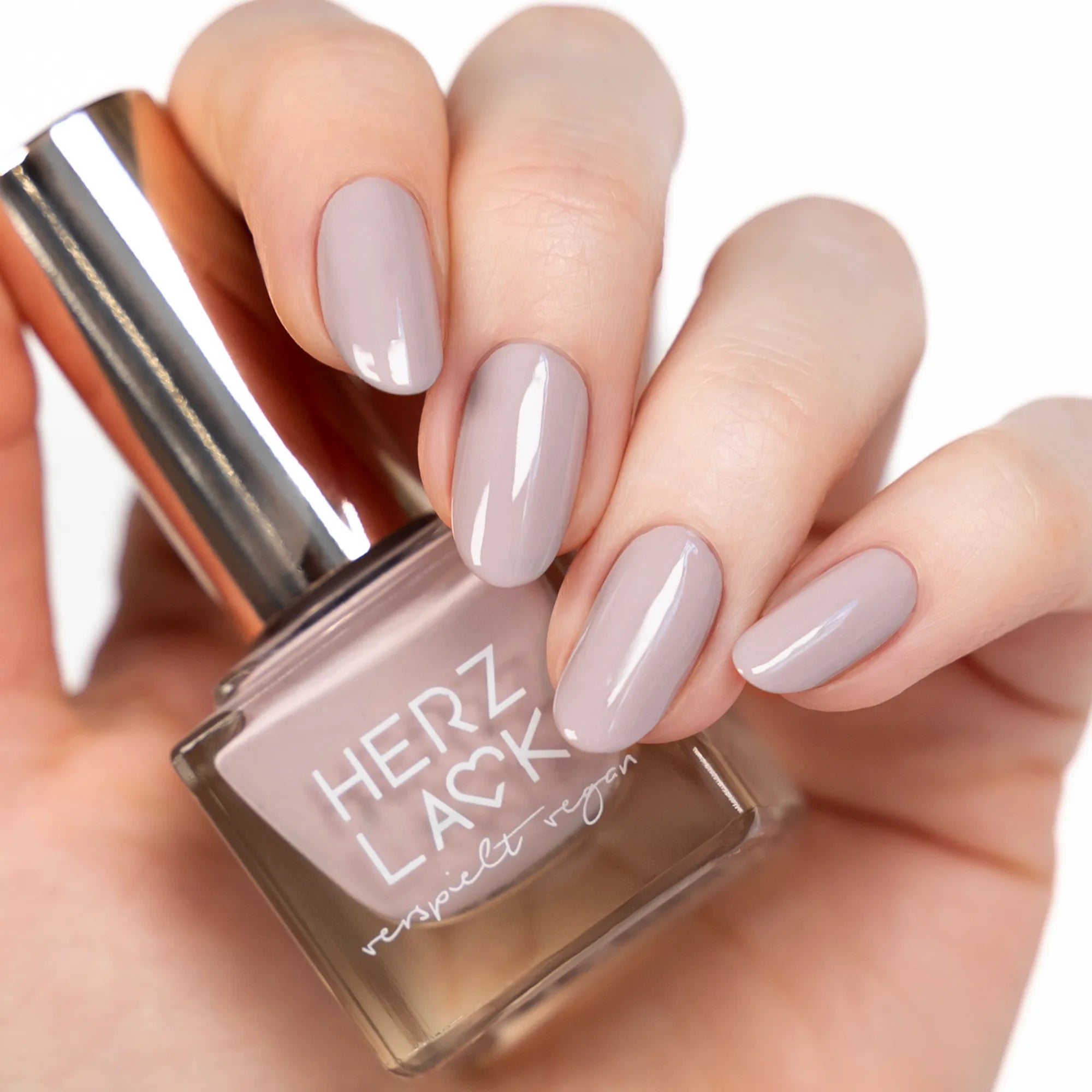 herzlack-greige-one-coater-veganer-nagellack-warmes-beige-mit-graunote-11ml image 2