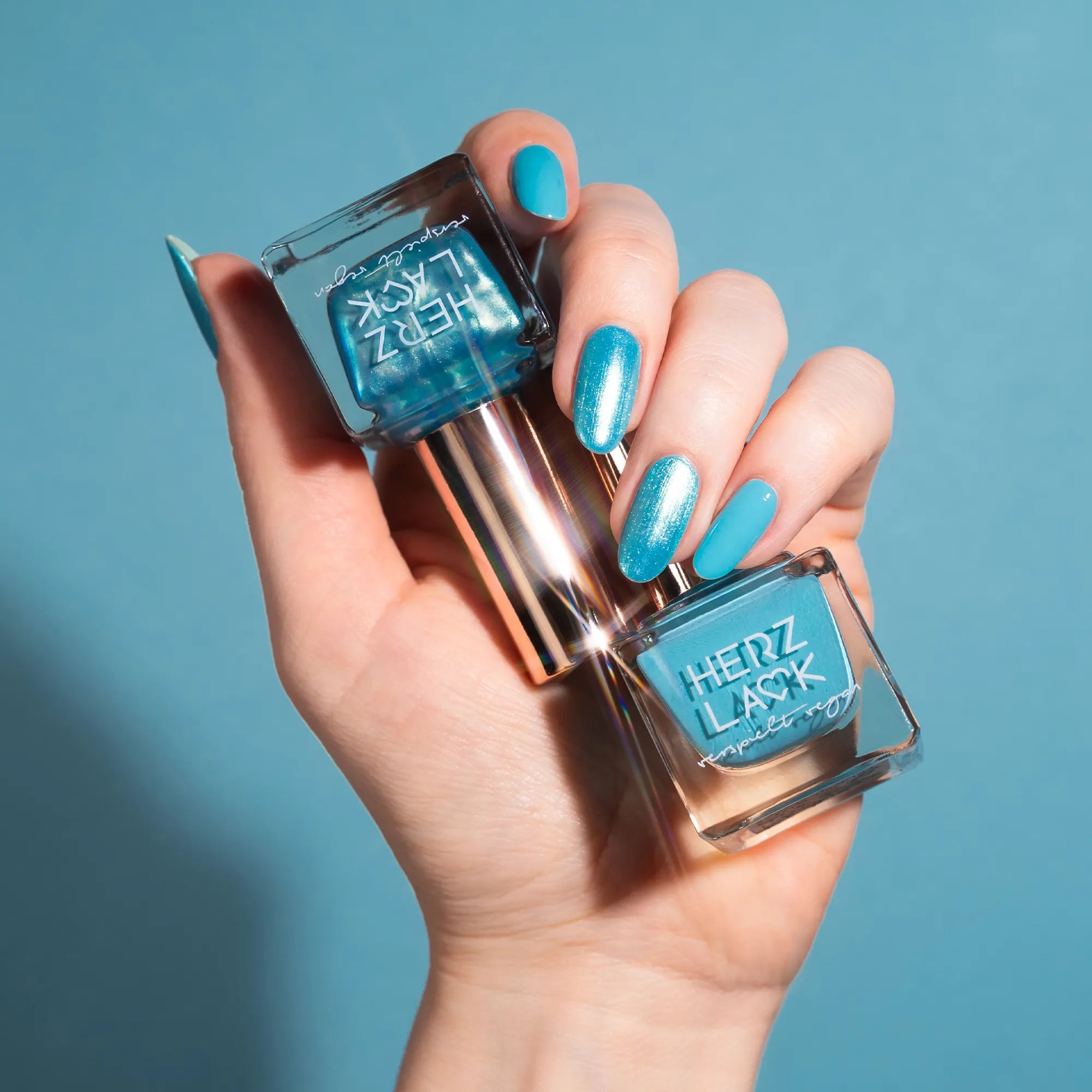 herzlack-blue-lagoon-duo-nagellack-set-one-coater-duochrome-topper image 2