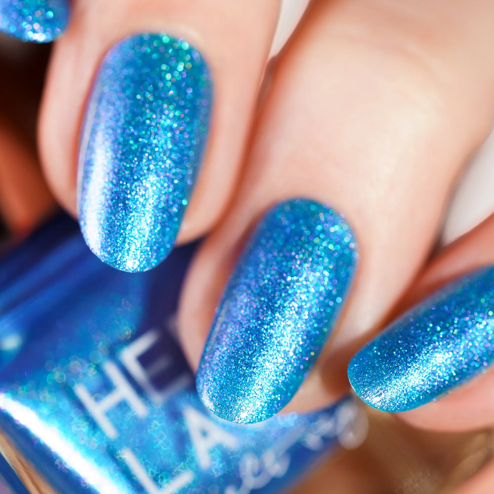 herzlack-meermaid-nagellack-blau-mit-rosa-blau-schimmer-und-holo-11-ml image 3