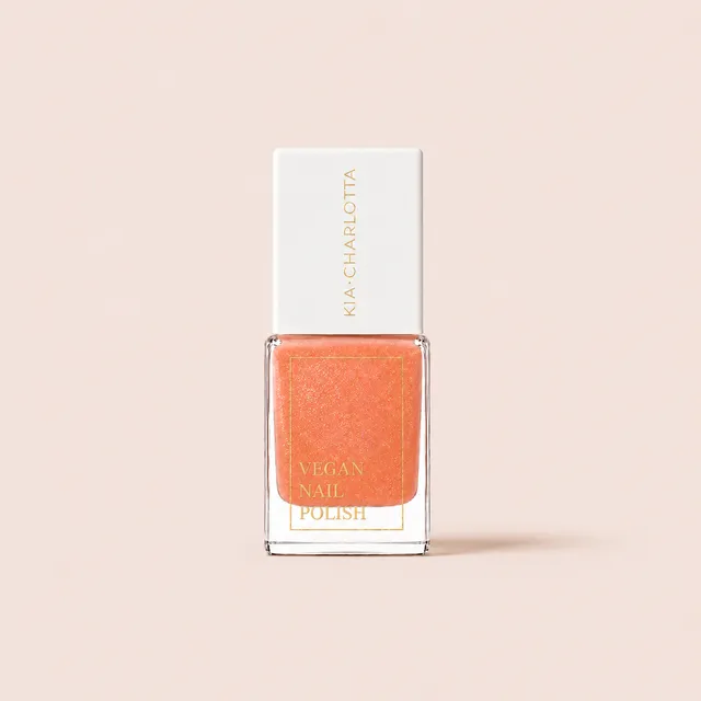 kia-charlotta-warm-words-veganer-nagellack-orange-schimmer image 1